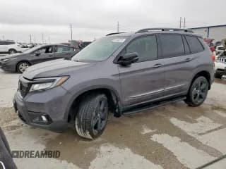 ✅ 2020 Honda Passport Elite • VIN: 5FNYF8H06LB018920 • Lot: 67444615. Listed on Copart with 37,992 mi. Free auction sales archive from the USA and detailed vehicle history report at DreamBid. Image 1.