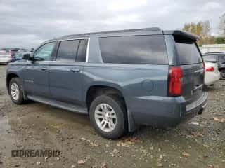 2020 Chevrolet Suburban LT z VIN 1GNSKHKC3LR201620, wystawiony jako Copart lot #74385964 z przebiegiem Nie podano mil oraz Szkoda całkowita • Salvage title. Historia ofert i sprzedaży dostępna na DreamBid. Obrazek 2.