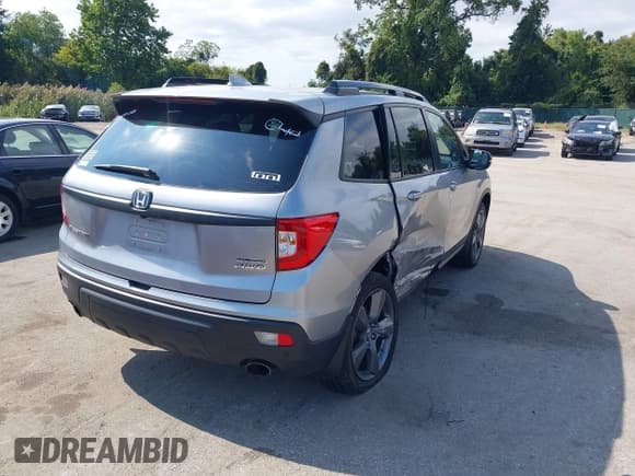 ✅ 2021 Honda Passport Touring • VIN: 5FNYF8H95MB040164 • Lot: 43274621. Wystawiony na IAAI z przebiegiem 125 665 mil. Bezpłatny archiwum sprzedaży aukcyjnych z USA i szczegółowy raport historii pojazdu na DreamBid. Zdjęcie 4.