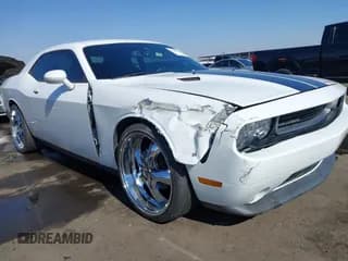 ✅ 2013 Dodge Challenger SXT • VIN: 2C3CDYAG3DH573945 • Lot: 41443472. Wystawiony na IAAI z przebiegiem 149 823 mil. Bezpłatny archiwum sprzedaży aukcyjnych z USA i szczegółowy raport historii pojazdu na DreamBid. Zdjęcie 6.