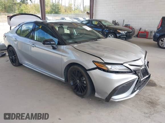 2022 Toyota Camry XSE with VIN 4T1K61BKXNU057880, listed as a IAAI auction lot 43031257 with 28,331 mi miles and . Bid and sale history available at DreamBid. Image 1.