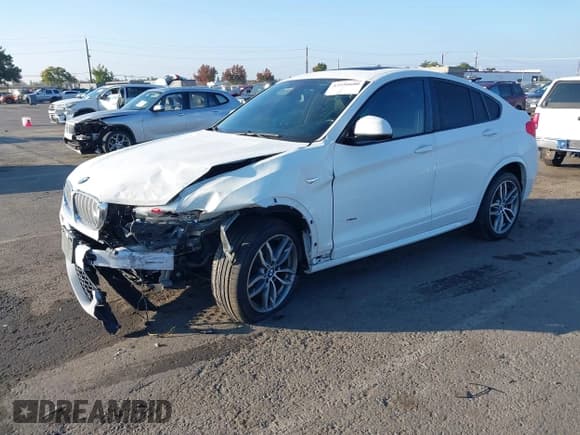 ✅ 2016 BMW X4 xDrive28i • VIN: 5UXXW3C58G0R22594 • Lot: 43550600. Wystawiony na IAAI z przebiegiem 96 471 mil. Bezpłatny archiwum sprzedaży aukcyjnych z USA i szczegółowy raport historii pojazdu na DreamBid. Zdjęcie 2.