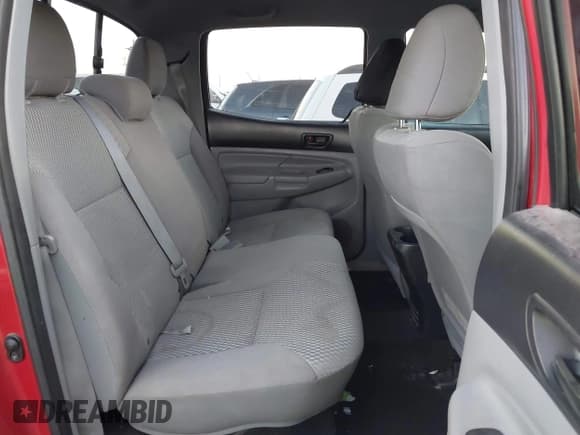 ✅ 2014 Toyota Tacoma PreRunner • VIN: 3TMJU4GN5EM159313 • Lot: 43633698. Listed on IAAI with 124,549 mi. Free auction sales archive from the USA and detailed vehicle history report at DreamBid. Image 8.