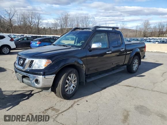 ✅ 2012 Nissan Frontier SV • VIN: 1N6AD0FV5CC424771 • Lot: 93446625. Listed on Copart with 214,180 mi. Free auction sales archive from the USA and detailed vehicle history report at DreamBid. Image 1.