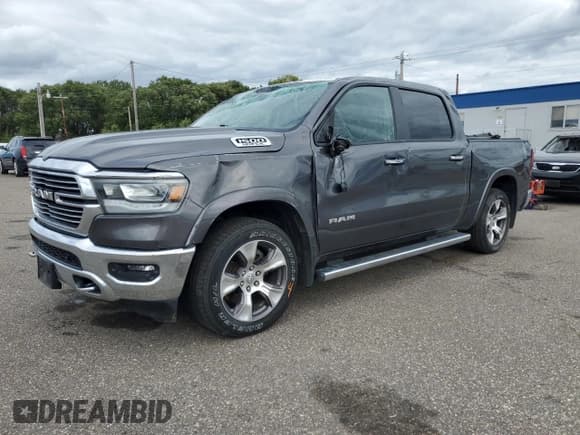 ✅ 2021 Ram 1500 Laramie • VIN: 1C6SRFJT2MN651799 • Лот: 71916495. Опубликован ранее на Copart с пробегом 135 186 миль. Бесплатный доступ к архиву аукционных продаж из США и подробный отчёт об истории автомобиля на DreamBid. Изображение 1.