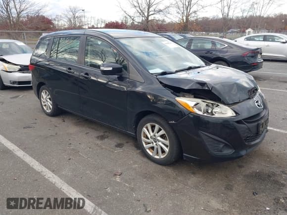 ✅ 2013 Mazda 5 Sport • VIN: JM1CW2BL9D0145428 • Lot: 43698738. Listed on IAAI with 191,620 mi. Free auction sales archive from the USA and detailed vehicle history report at DreamBid. Image 1.
