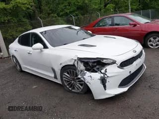 ✅ 2018 Kia Stinger • VIN: KNAE15LA0J6033127 • Lot: 42355438. Listed on IAAI with 104,255 mi. Free auction sales archive from the USA and detailed vehicle history report at DreamBid. Image 1.