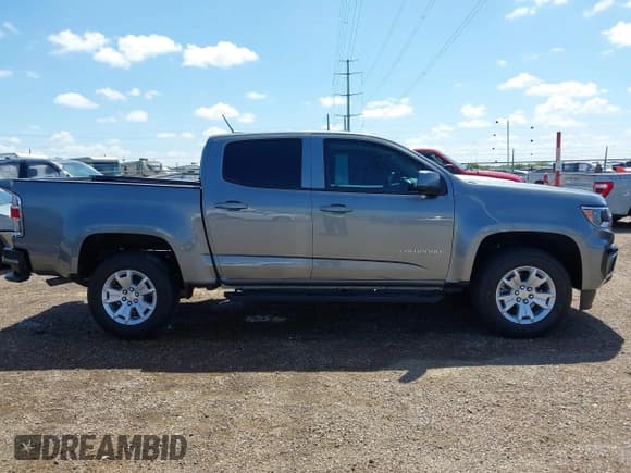 ✅ 2022 Chevrolet Colorado 2WD LT • VIN: 1GCGSCEN2N1319741 • Lot: 43089817. Listed on IAAI with 19,870 mi. Free auction sales archive from the USA and detailed vehicle history report at DreamBid. Image 14.