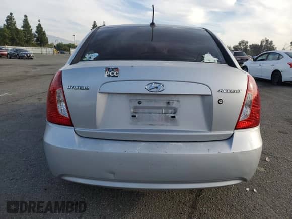 2008 Hyundai Accent GLS z VIN KMHCN46C98U234256, wystawiony jako Copart lot #83089384 z przebiegiem 153 802 mil mil oraz Szkoda całkowita • Salvage title. Historia ofert i sprzedaży dostępna na DreamBid. Obrazek 6.