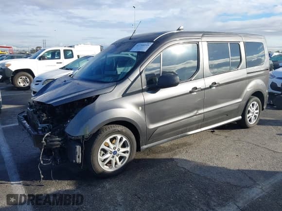 ✅ 2021 Ford Transit Connect XLT • VIN: NM0GS9F26M1487725 • Lot: 43704125. Listed on IAAI with 59,567 mi. Free auction sales archive from the USA and detailed vehicle history report at DreamBid. Image 2.