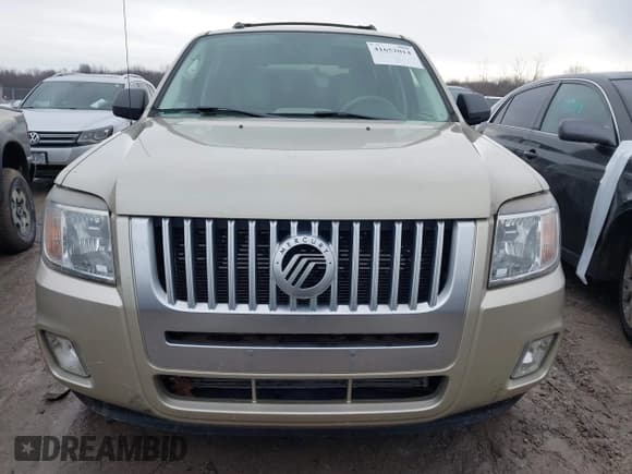 ✅ 2011 Mercury Mariner • VIN: 4M2CN8B76BKJ06851 • Lot: 41652014. Listed on IAAI with 118,914 mi. Free auction sales archive from the USA and detailed vehicle history report at DreamBid. Image 12.