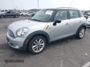✅ 2013 MINI Countryman • VIN: WMWZB3C5XDWM09519 • Lot: 42665715. Listed on IAAI with 127,891 mi. Free auction sales archive from the USA and detailed vehicle history report at DreamBid. Image 2.