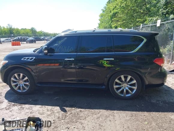 ✅ 2013 Infiniti QX56 • VIN: JN8AZ2NE9D9060441 • Lot: 42292660. Listed on IAAI with 158,994 mi. Free auction sales archive from the USA and detailed vehicle history report at DreamBid. Image 14.