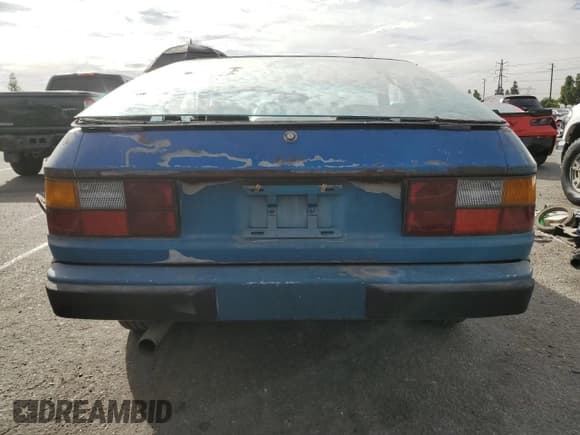 ✅ 1979 Porsche 924 • VIN: 9249200475 • Lot: 92125205. Wystawiony na Copart z przebiegiem 98 021 mil. Bezpłatny archiwum sprzedaży aukcyjnych z USA i szczegółowy raport historii pojazdu na DreamBid. Zdjęcie 6.