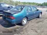 ✅ 1997 Nissan Altima XE • VIN: 1N4BU31D1VC199720 • Lot: 42061192. Listed on IAAI with 312,370 mi. Free auction sales archive from the USA and detailed vehicle history report at DreamBid. Image 4.