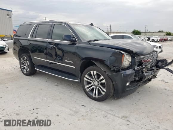 ✅ 2017 GMC Yukon Denali • VIN: 1GKS1CKJ9HR390072 • Lot: 63563155. Listed on Copart with 96,343 mi. Free auction sales archive from the USA and detailed vehicle history report at DreamBid. Image 4.