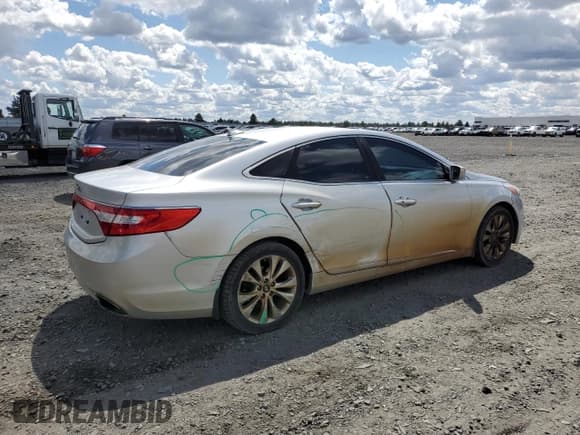 ✅ 2013 Hyundai Azera • VIN: KMHFG4JG7DA218926 • Лот: 57419495. Опубликован ранее на Copart с пробегом 90 968 миль. Бесплатный доступ к архиву аукционных продаж из США и подробный отчёт об истории автомобиля на DreamBid. Изображение 3.