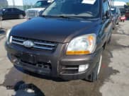 ✅ 2006 Kia Sportage LX • VIN: KNDJE723267219158 • Lot: 42055910. Listed on IAAI with 156,906 mi. Free auction sales archive from the USA and detailed vehicle history report at DreamBid. Image 6.