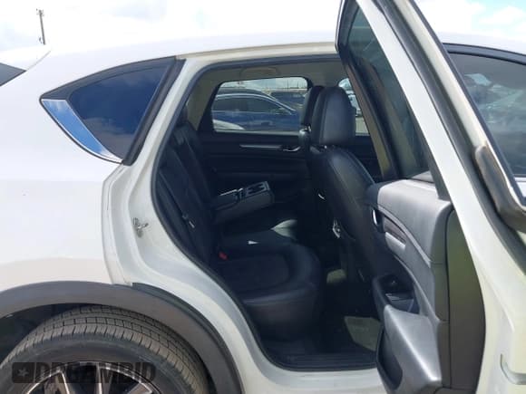 ✅ 2018 Mazda CX-5 Touring • VIN: JM3KFACM6J1409067 • Лот: 43716812. Опубликован ранее на IAAI с пробегом 76 489 миль. Бесплатный доступ к архиву аукционных продаж из США и подробный отчёт об истории автомобиля на DreamBid. Изображение 8.