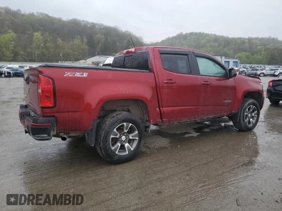 ✅ 2019 Chevrolet Colorado 4WD Z71 • VIN: 1GCGTDEN2K1277571 • Лот: 54478355. Опубликован ранее на Copart с пробегом 72 823 миль. Бесплатный доступ к архиву аукционных продаж из США и подробный отчёт об истории автомобиля на DreamBid. Изображение 3.