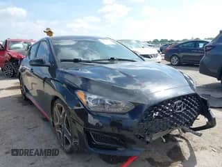 2020 Hyundai Veloster z VIN KMHT36AH9LU007422, wystawiony jako IAAI lot #42513370 z przebiegiem 102 805 mil mil oraz . Historia ofert i sprzedaży dostępna na DreamBid. Obrazek 1.