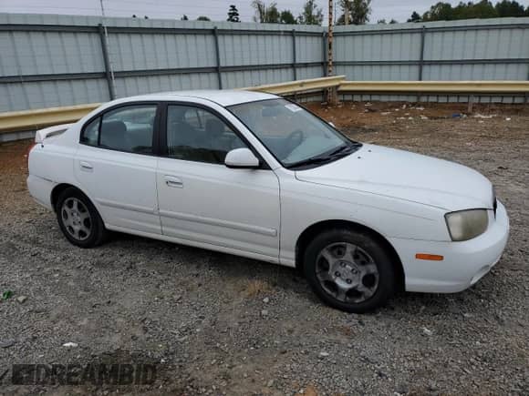 2002 Hyundai Elantra GLS with VIN KMHDN45D82U245688, listed as a Copart auction lot 72620044 with 156,266 mi miles and Salvage title. Bid and sale history available at DreamBid. Image 4.