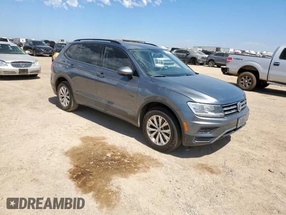 ✅ 2018 Volkswagen Tiguan S • VIN: 3VV1B7AX8JM070459 • Lot: 70947045. Listed on Copart with 150,564 mi. Free auction sales archive from the USA and detailed vehicle history report at DreamBid. Image 4.