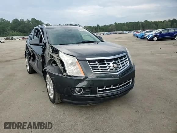 ✅ 2015 Cadillac SRX Premium Collection • VIN: 3GYFNDE39FS623019 • Lot: 69189535. Listed on Copart with 82,679 mi. Free auction sales archive from the USA and detailed vehicle history report at DreamBid. Image 14.