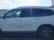 ✅ 2021 Honda Pilot Touring 8-Passenger • VIN: 5FNYF6H95MB091006 • Лот: 42509101. Опубликован ранее на IAAI с пробегом 43 879 миль. Бесплатный доступ к архиву аукционных продаж из США и подробный отчёт об истории автомобиля на DreamBid. Изображение 14.