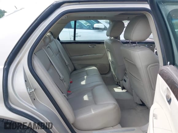 ✅ 2009 Cadillac DTS 1SA • VIN: 1G6KD57Y19U127449 • Lot: 42116152. Listed on IAAI with 107,901 mi. Free auction sales archive from the USA and detailed vehicle history report at DreamBid. Image 8.