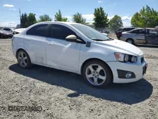 2014 Chevrolet Sonic LTZ с VIN 1G1JE5SG0E4123626, выставлен на аукционе Copart как лот 61103254 с пробегом 158 390 миль миль и Списание • Salvage title. История ставок и продаж доступна на DreamBid. Изображение 4.
