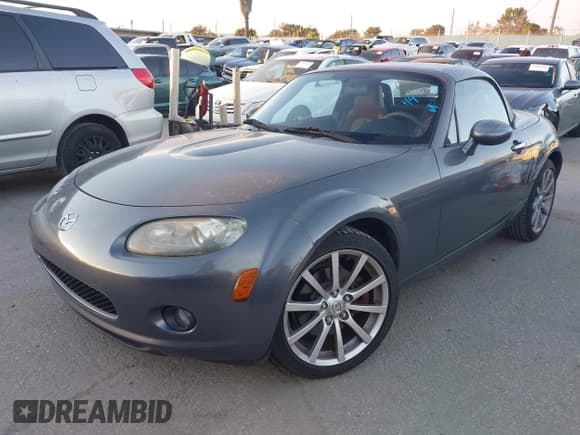 ✅ 2007 Mazda MX-5 Miata Grand Touring • VIN: JM1NC26F870126010 • Lot: 43847751. Listed on IAAI with 171,868 mi. Free auction sales archive from the USA and detailed vehicle history report at DreamBid. Image 2.