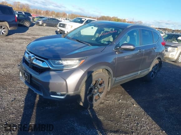 ✅ 2017 Honda CR-V Touring • VIN: 2HKRW2H97HH612456 • Lot: 43560410. Listed on IAAI with 120,652 mi. Free auction sales archive from the USA and detailed vehicle history report at DreamBid. Image 2.