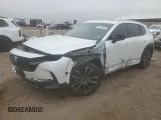 ✅ 2023 Mazda CX-50 S Premium Plus • VIN: 7MMVABEM4PN129351 • Lot: 64524805. Wystawiony na Copart z przebiegiem 31 093 mil. Bezpłatny archiwum sprzedaży aukcyjnych z USA i szczegółowy raport historii pojazdu na DreamBid. Zdjęcie 1.