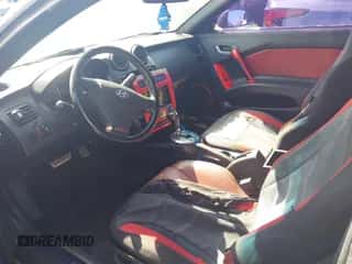 2007 Hyundai Tiburon GT с VIN KMHHN66F97U235966, выставлен на аукционе IAAI как лот 41560704 с пробегом 255 041 миль миль и . История ставок и продаж доступна на DreamBid. Изображение 5.