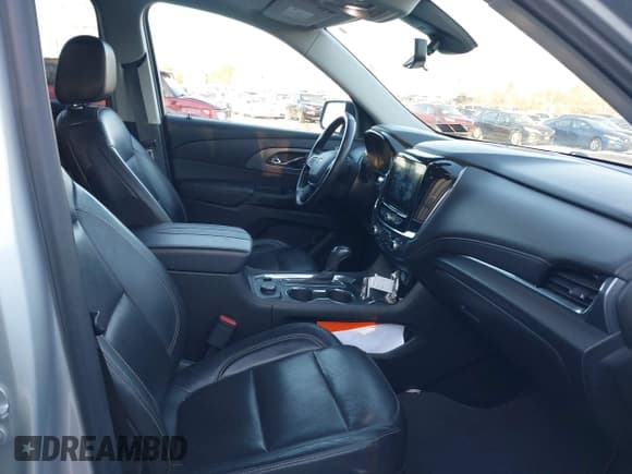 ✅ 2020 Chevrolet Traverse Premier • VIN: 1GNEVKKW0LJ296745 • Lot: 41284830. Listed on IAAI with 76,373 mi. Free auction sales archive from the USA and detailed vehicle history report at DreamBid. Image 5.