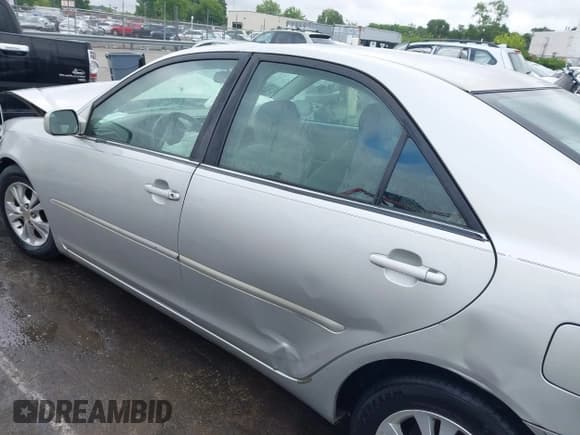 ✅ 2004 Toyota Camry LE • VIN: 4T1BF32K24U070150 • Lot: 42390540. Listed on IAAI with 380,768 mi. Free auction sales archive from the USA and detailed vehicle history report at DreamBid. Image 14.