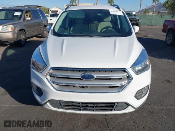 ✅ 2018 Ford Escape SE • VIN: 1FMCU9GD8JUC60344 • Lot: 43691921. Wystawiony na IAAI z przebiegiem 92 771 mil. Bezpłatny archiwum sprzedaży aukcyjnych z USA i szczegółowy raport historii pojazdu na DreamBid. Zdjęcie 6.