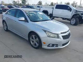 ✅ 2014 Chevrolet Cruze 2LT • VIN: 1G1PE5SB9E7432833 • Lot: 43747858. Listed on IAAI with 164,286 mi. Free auction sales archive from the USA and detailed vehicle history report at DreamBid. Image 1.