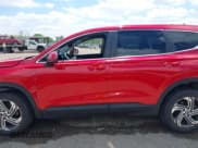 ✅ 2021 Hyundai Santa Fe SE • VIN: 5NMS14AJXMH336085 • Lot: 42301440. Listed on IAAI with 23,612 mi. Free auction sales archive from the USA and detailed vehicle history report at DreamBid. Image 14.