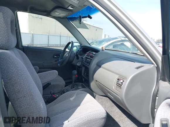 ✅ 2001 Suzuki XL7 Standard • VIN: JS3TX92V514103609 • Lot: 42146285. Listed on IAAI with 218,524 mi. Free auction sales archive from the USA and detailed vehicle history report at DreamBid. Image 5.