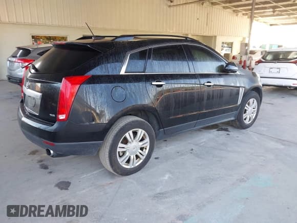 ✅ 2015 Cadillac SRX • VIN: 3GYFNAE39FS527440 • Lot: 43805687. Listed on IAAI with 135,182 mi. Free auction sales archive from the USA and detailed vehicle history report at DreamBid. Image 4.