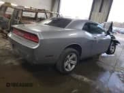 ✅ 2014 Dodge Challenger SXT • VIN: 2C3CDYAG1EH181709 • Lot: 77967864. Wystawiony na Copart z przebiegiem Nie podano. Bezpłatny archiwum sprzedaży aukcyjnych z USA i szczegółowy raport historii pojazdu na DreamBid. Zdjęcie 3.