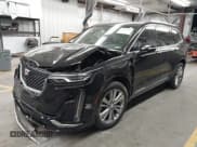 ✅ 2024 Cadillac XT6 FWD Premium Luxury • VIN: 1GYKPCRS2RZ702060 • Lot: 43008482. Listed on IAAI with 112,893 mi. Free auction sales archive from the USA and detailed vehicle history report at DreamBid. Image 2.
