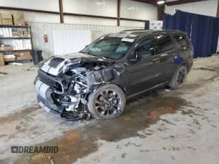 2023 Dodge Durango R/T Plus with VIN 1C4SDHCT8PC675427, listed as a Copart auction lot 50765375 with 32,024 mi miles and Salvage title. Bid and sale history available at DreamBid. Image 1.