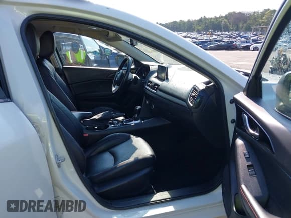 ✅ 2014 Mazda 3 S Grand Touring • VIN: JM1BM1M34E1135720 • Лот: 42801204. Опубликован ранее на IAAI с пробегом 113 304 миль. Бесплатный доступ к архиву аукционных продаж из США и подробный отчёт об истории автомобиля на DreamBid. Изображение 5.