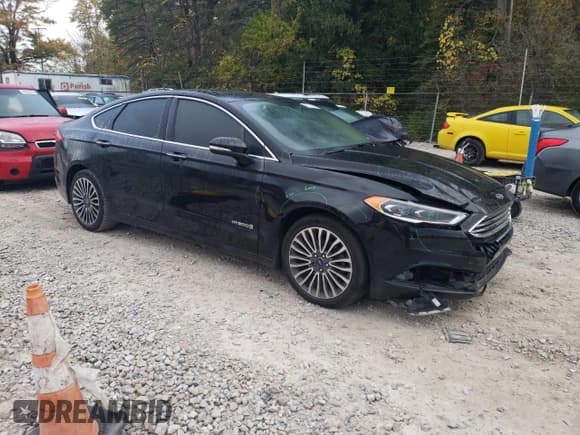 ✅ 2017 Ford Fusion Hybrid Titanium • VIN: 3FA6P0RU7HR278472 • Lot: 82434245. Wystawiony na Copart z przebiegiem 144 287 mil. Bezpłatny archiwum sprzedaży aukcyjnych z USA i szczegółowy raport historii pojazdu na DreamBid. Zdjęcie 4.