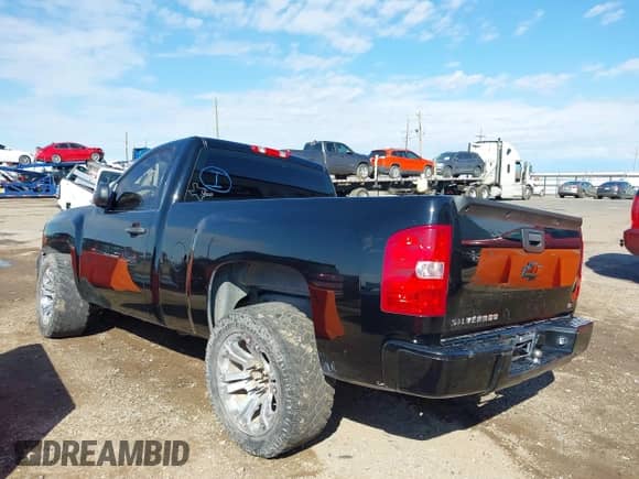 2012 Chevrolet Silverado 1500 Work Truck z VIN 1GCNCPEX6CZ201218, wystawiony jako IAAI lot #43355011 z przebiegiem 127 659 mil mil oraz . Historia ofert i sprzedaży dostępna na DreamBid. Obrazek 3.