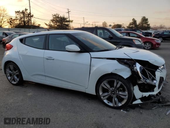 ✅ 2015 Hyundai Veloster • VIN: KMHTC6AD6FU237811 • Lot: 83592974. Listed on Copart with 122,604 mi. Free auction sales archive from the USA and detailed vehicle history report at DreamBid. Image 4.