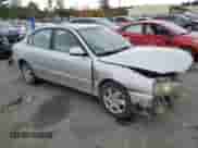 2004 Hyundai Elantra GLS z VIN KMHDN46D34U885437, wystawiony jako Copart lot #78289994 z przebiegiem 140 182 mil mil oraz Szkoda całkowita • Salvage title. Historia ofert i sprzedaży dostępna na DreamBid. Obrazek 4.